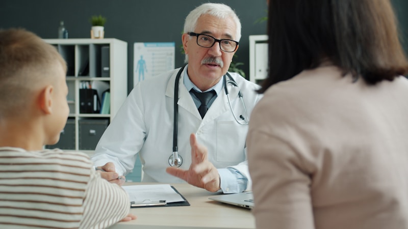 Licensed healthcare provider consulting with a patient
